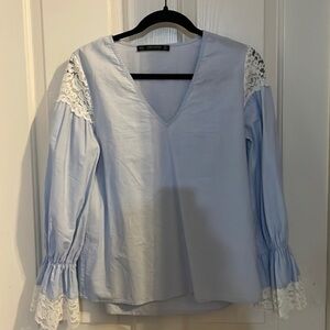 Zara size medium top on light blue